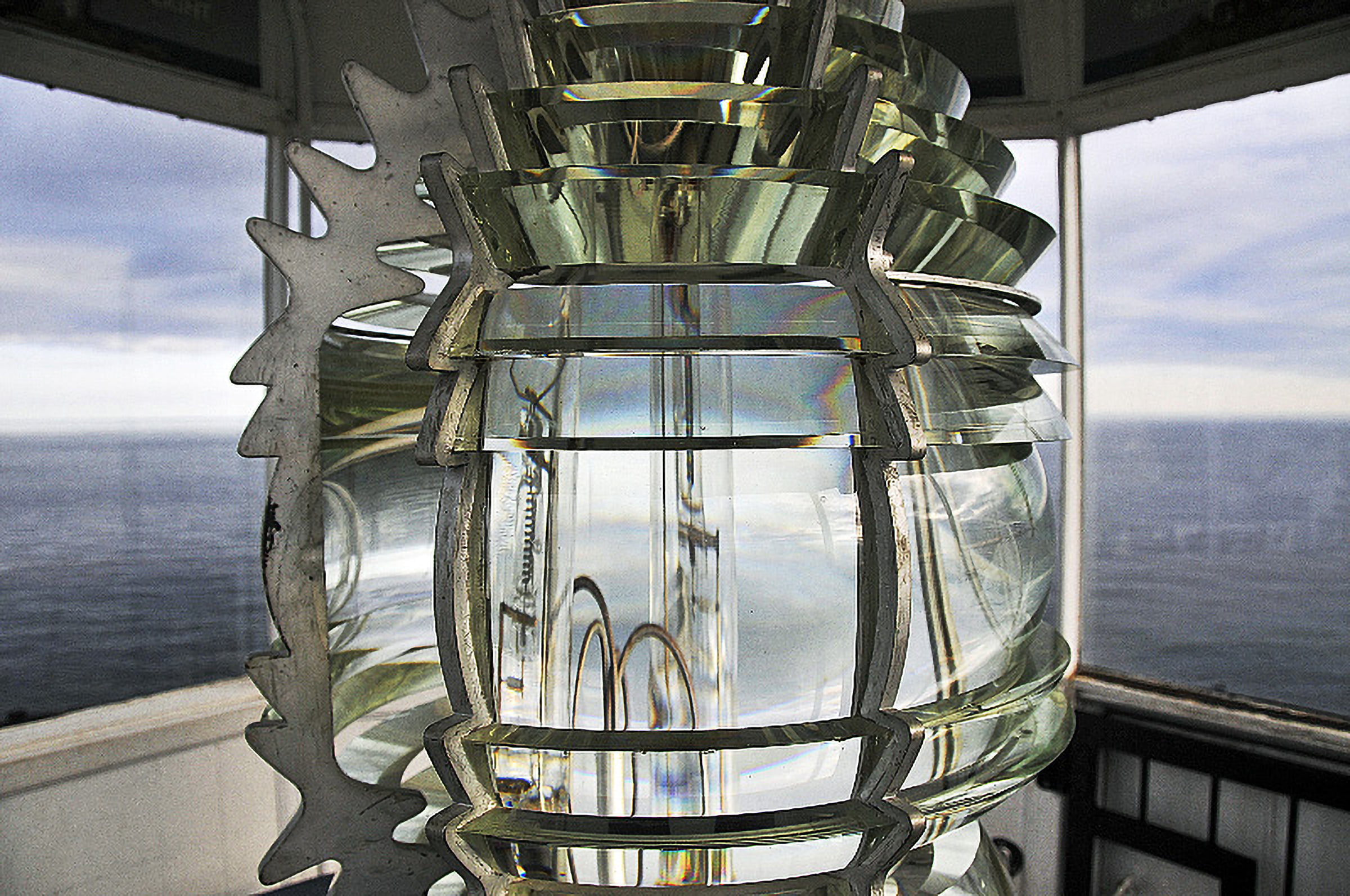 An image of a Fresnel lens reflecting the sky.