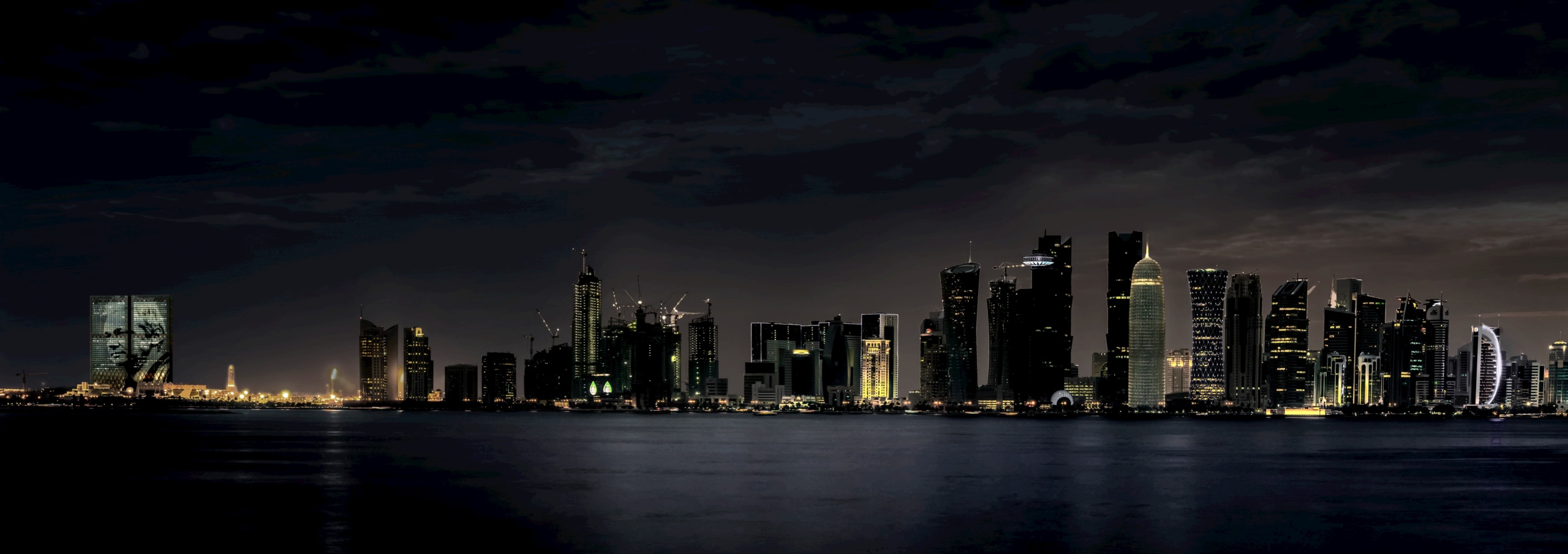 Night visualization of Al Jazeera Headquarters as seen from Doha Bay.