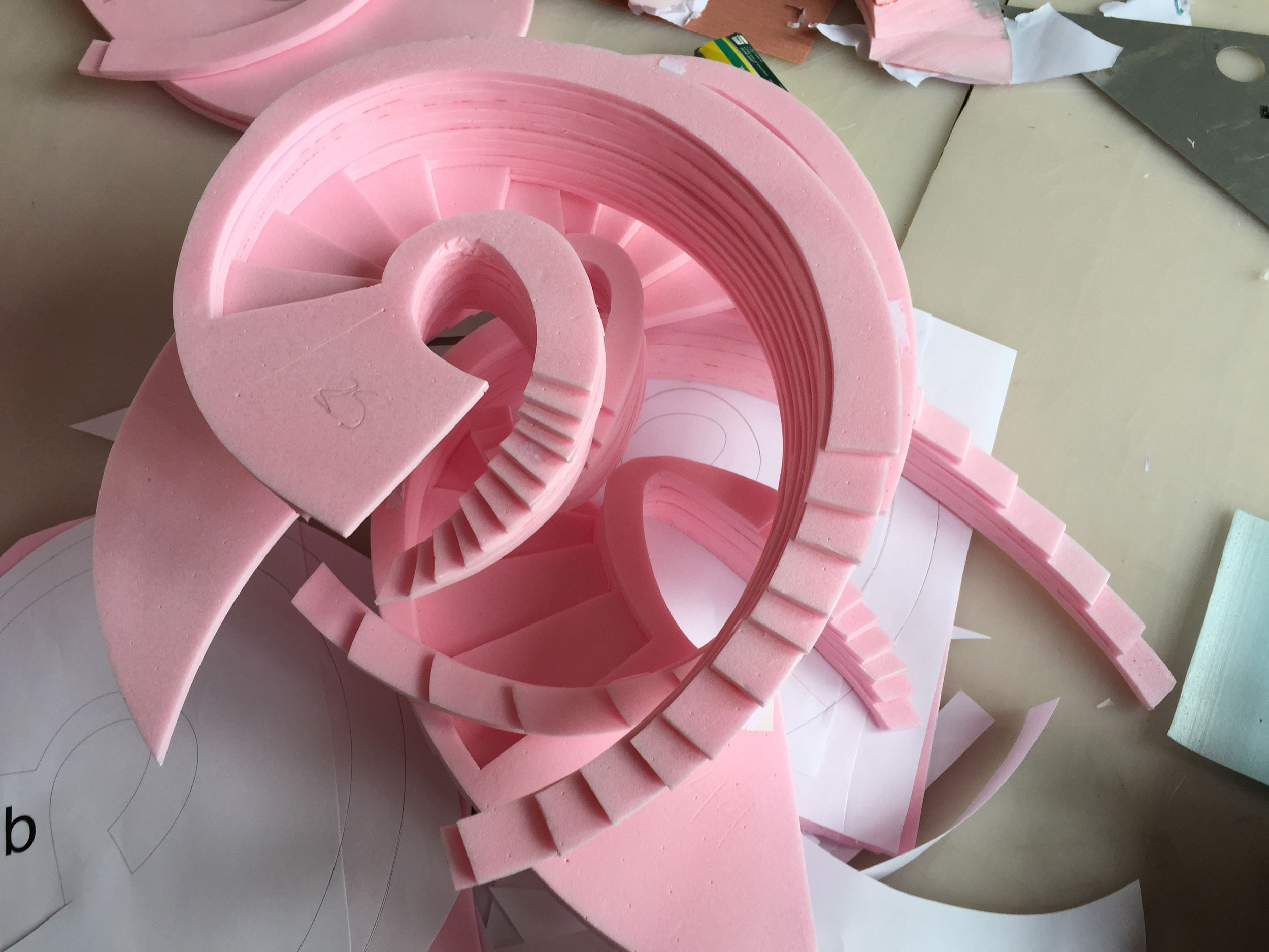 A photograph of the Necklace Residence sculptural stair model being constructed.